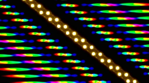 Beautiful bright multi-color image of light diffraction from a rotating LEDs Stock-Footage 130383517