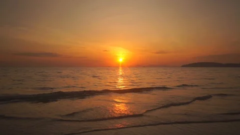 Beautiful bright orange sunset over the Indian Stock Footage 108796516