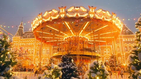 Beautiful brightly glowing carousel on the Red Square decorated and arranged for Stock Footage 113468994