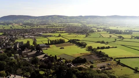 Beautiful British North Wales patchwork countryside rural misty farmland Stock Footage 139296742