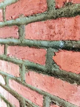 Beautiful brown brick wall texture or background. Stone wall background. Fotos de archivo