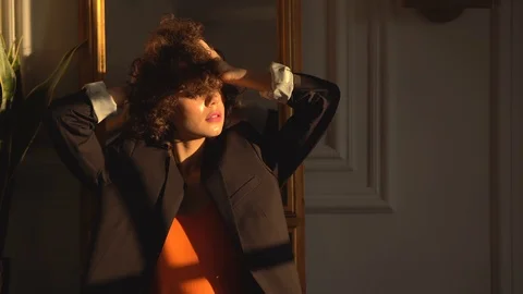 Beautiful brunette in a black jacket Stock Footage 102832279