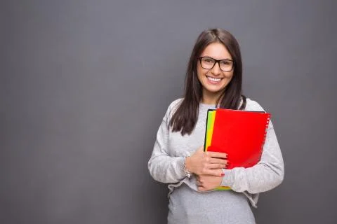 Beautiful brunette with files Stock Photos