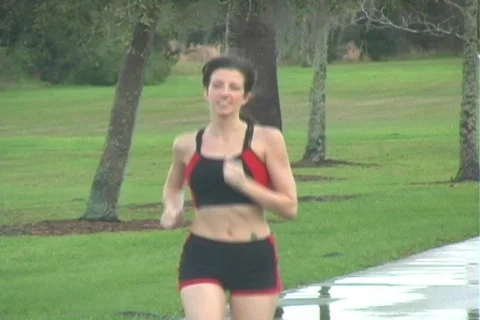 Beautiful Brunette Jogging (2) 動画素材 100880