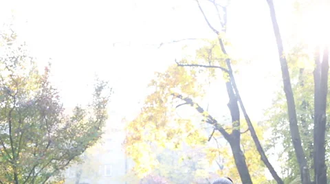 Beautiful brunette woman singing and man playing guitar in park Stock Footage 59556898