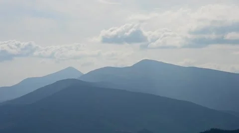 Beautiful bubbling clouds over Carpathian Mountains Stock Footage 54149322