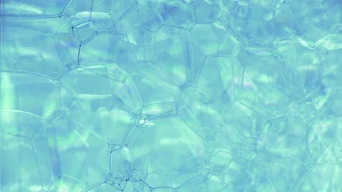 Beautiful bubbly pattern with liquid ink flowing through Stock Footage 127924745