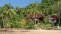 Beautiful bungalows amongst palm trees on the Koh Wai island in Thailand HD Footage