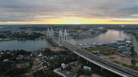 A beautiful cable-stayed bridge in the evening cityscape at sunset 库存影片 319865929