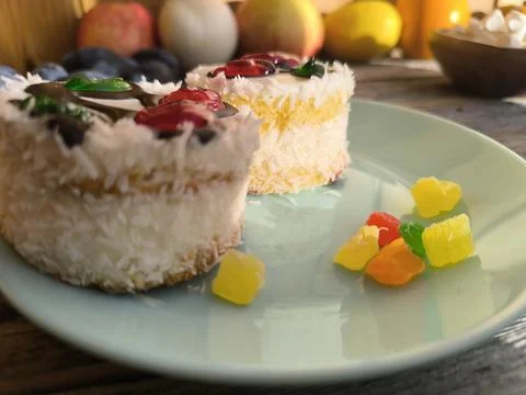 Beautiful cake with a cherry pattern on a plate. Fotos de archivo