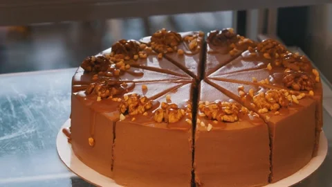 A beautiful cake with walnuts close up 스톡 동영상 280060789