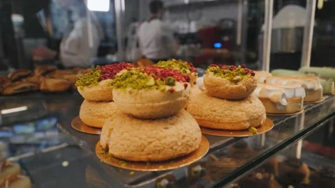 Beautiful cakes in the cafe window Stock Footage 171412994