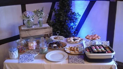 Beautiful candy bar on a blue background Stock Footage 79385960