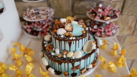 Beautiful candy bar with cakes and candies for birthday Stock Footage 99740348