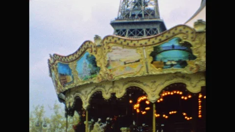 Beautiful Carousel/Merry-Go-Round with Eiffel Tower in Background-Super 8-Paris Stock Footage 128575992
