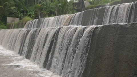 Beautiful cascade waterfall flow from oblique angle Stock Footage 234675216