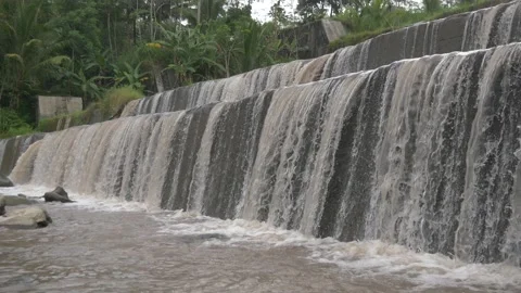 Beautiful cascading waterfall stream from the side bottom corner Stock Footage 234675991