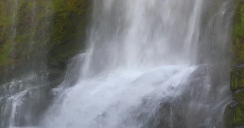 Beautiful Cascading Waterfalls Creating Soft Patterns Running Over The Rock Face Video stock 138409158