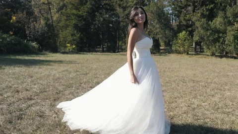 Beautiful Caucasian Bride Posing For The Camera Nice Graceful Gait Video stock 141819474
