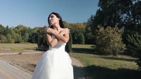 Beautiful Caucasian Bride Posing For The Camera Nice Graceful Gait Video stock 141819588