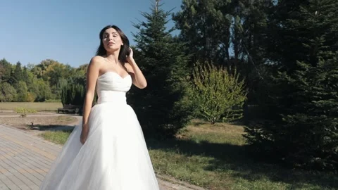 Beautiful Caucasian Bride Posing For The Camera Nice Graceful Gait Video stock 141819609