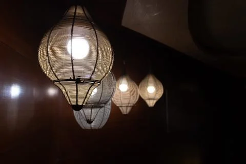 Beautiful ceiling lights hanging down from the roof in romantic concept. Foto stock