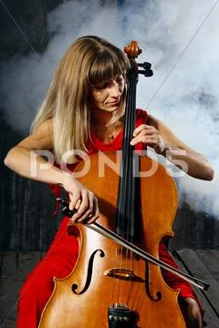 Beautiful cello musician Stock Photos