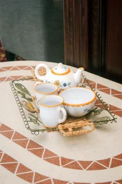 Beautiful ceramic tea set on a table Stock Photos