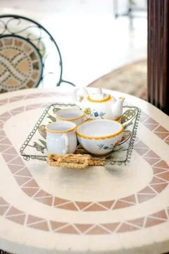Beautiful ceramic tea set on a table Stock Photos