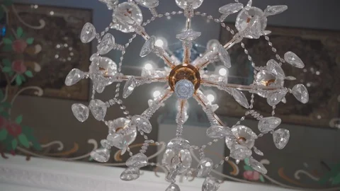 Beautiful chandelier with mirrored ceiling Stock Footage 129237316