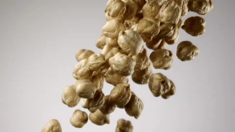 Beautiful chickpeas falling in slow motion Stock Footage 151041883