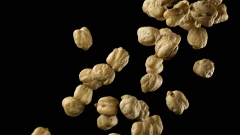 Beautiful chickpeas falling in slow motion Stock Footage 151108790