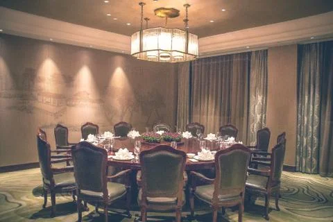 Beautiful chinese restaurant with table setting and china porcelain Stock Photos