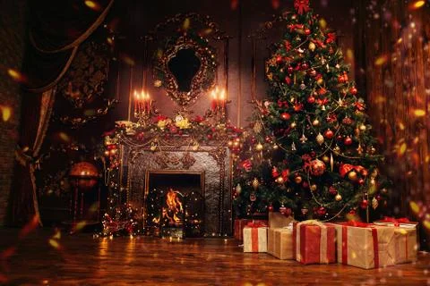 Beautiful Christmas interior with Christmas tree and fireplace. Holiday decor Stock Photos
