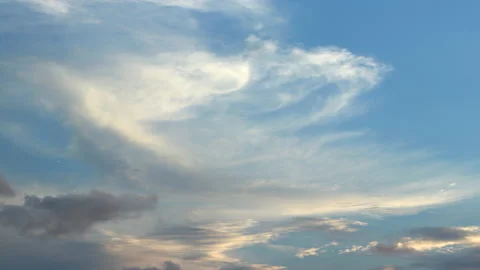 Beautiful cirrus blue clouds fly in the blue sky, daytime. Timelapse, relaxation Stock Footage 162850313