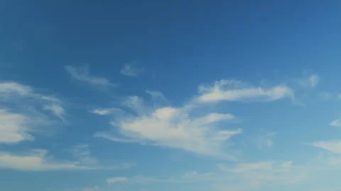 Beautiful cirrus cloud formations in a deep blue sky. Soft cirrus couds on blue Stock Footage 265080324