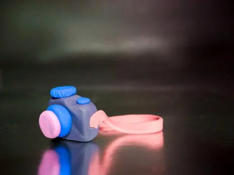 Beautiful clay camera isolate on silver background Stock Photos