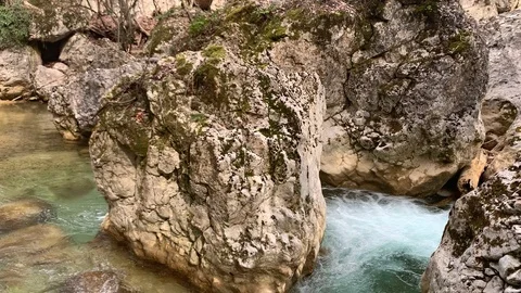 Beautiful clean mountain river flows over the rocks Stock Footage 104617550