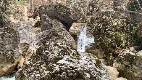 Beautiful clean mountain river flows over the rocks Stock Footage 104617741