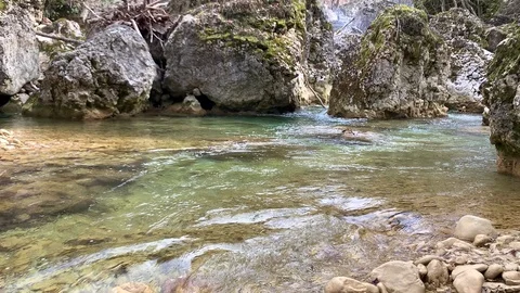 Beautiful clean mountain river flows over the rocks Stock Footage 104617989