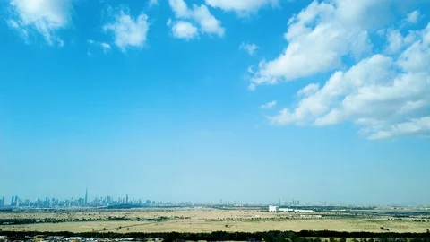 Beautiful clear blue sky with clouds in Dubai skyline Timeline Video stock 120592065