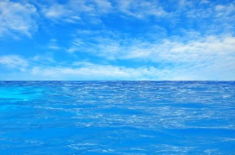 Beautiful clear sea water and blue summer sky Photos