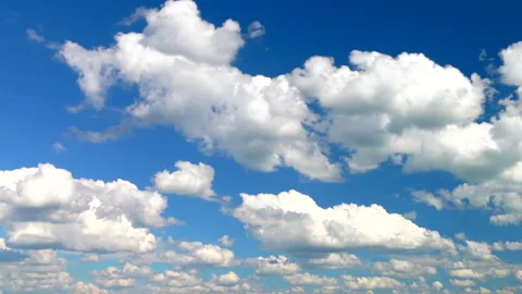 Beautiful clear white clouds at view clean blue sky background. ProRes 422 HQ. 库存影片 247698590