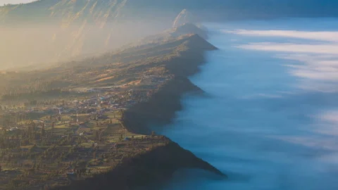 Beautiful Cliff Side Village Sunlight and Misty, Landmark Travel of Indonesia Stock Footage 131662647