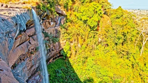 Beautiful cliff waterfall seamless loop Stock Footage 100535570