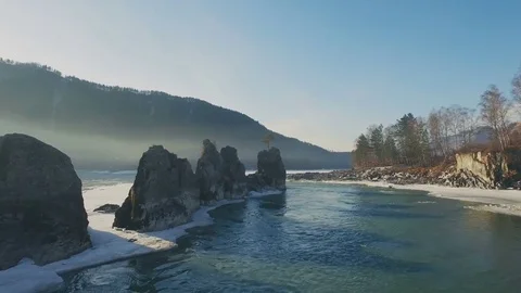 Beautiful cliffs with a young pine tree in the mountain river, aerial Video stock 74086537