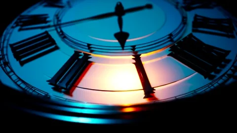 Beautiful clock animation with orange light show numbers on watch. Camera th Stock-Footage 262383776