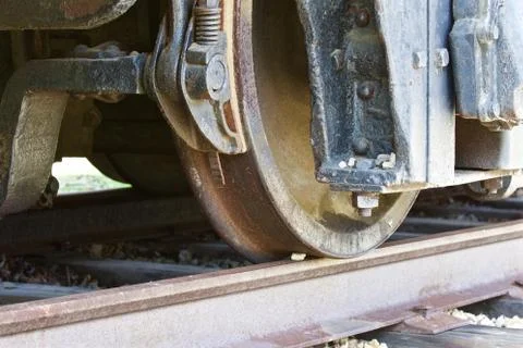 Beautiful close-up of the old train wheels and the road Stock Photos