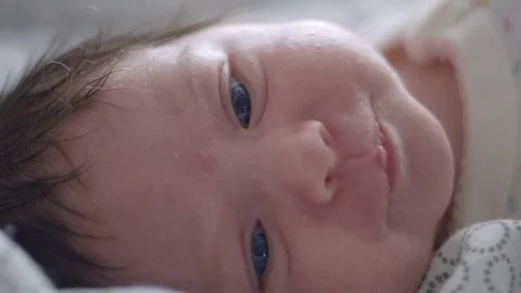 Beautiful close-up of a one-month old baby Stock Footage 107572627