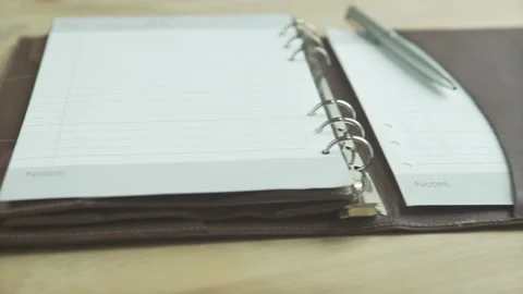 Beautiful close up shot open elegant light brown leather case note book pad dail Stockbeeldmateriaal 137539019